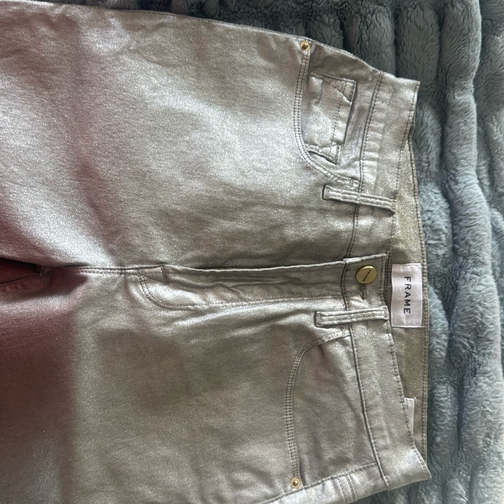 Stretchy silver skinny jeans worn once.